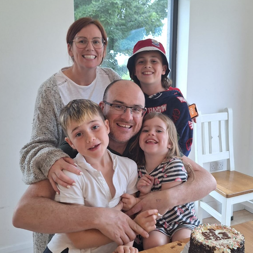 Niamh with her husband and three children at home